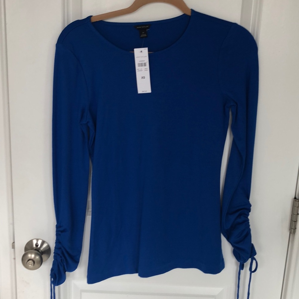 New with tags - shirt with ties on end of sleeves
